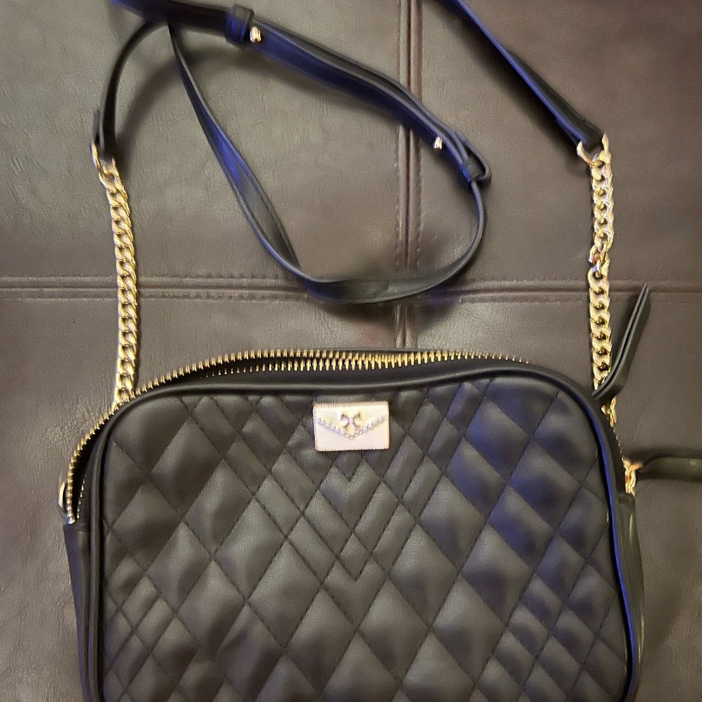Small black cross body double pockets great condition & clean
